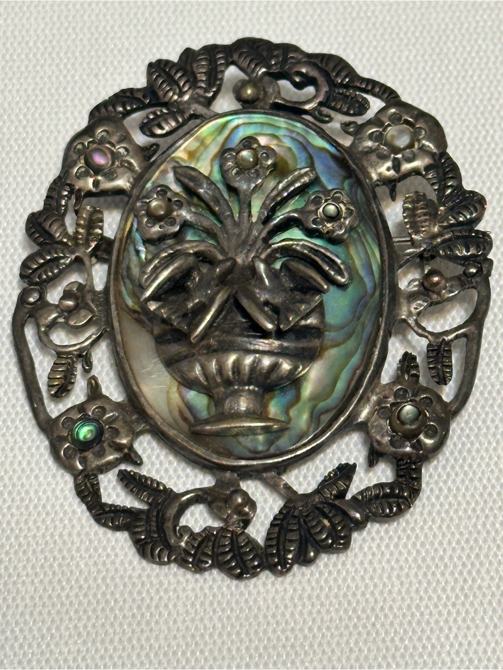 Vintage Mexican sterling silver and abalone shell floral brooch and pendant.